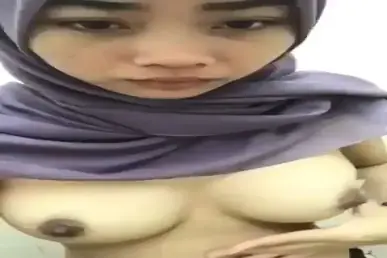 Bokep Jilbab Ungu Remas Tete Gede Sampe Memek Basah Banjir